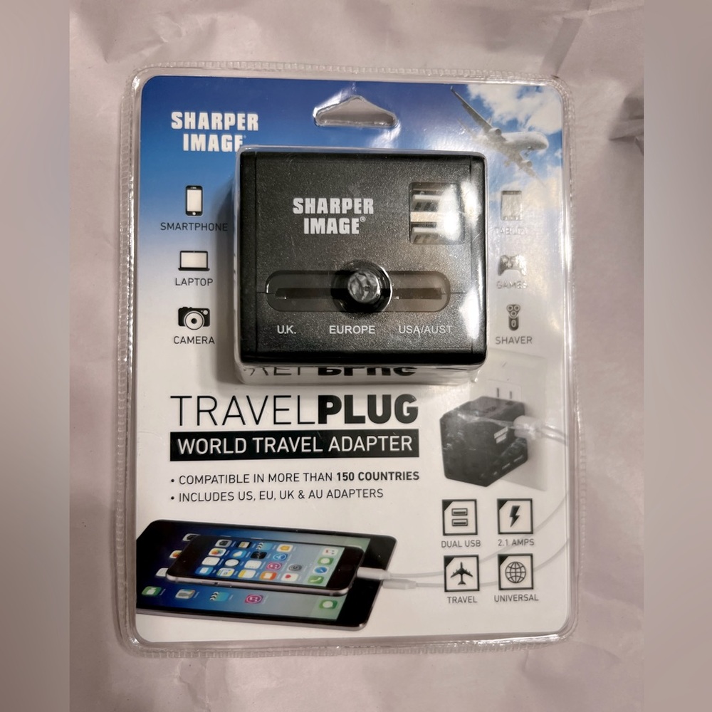 Brand new Sharper Image travel adapter travel plug